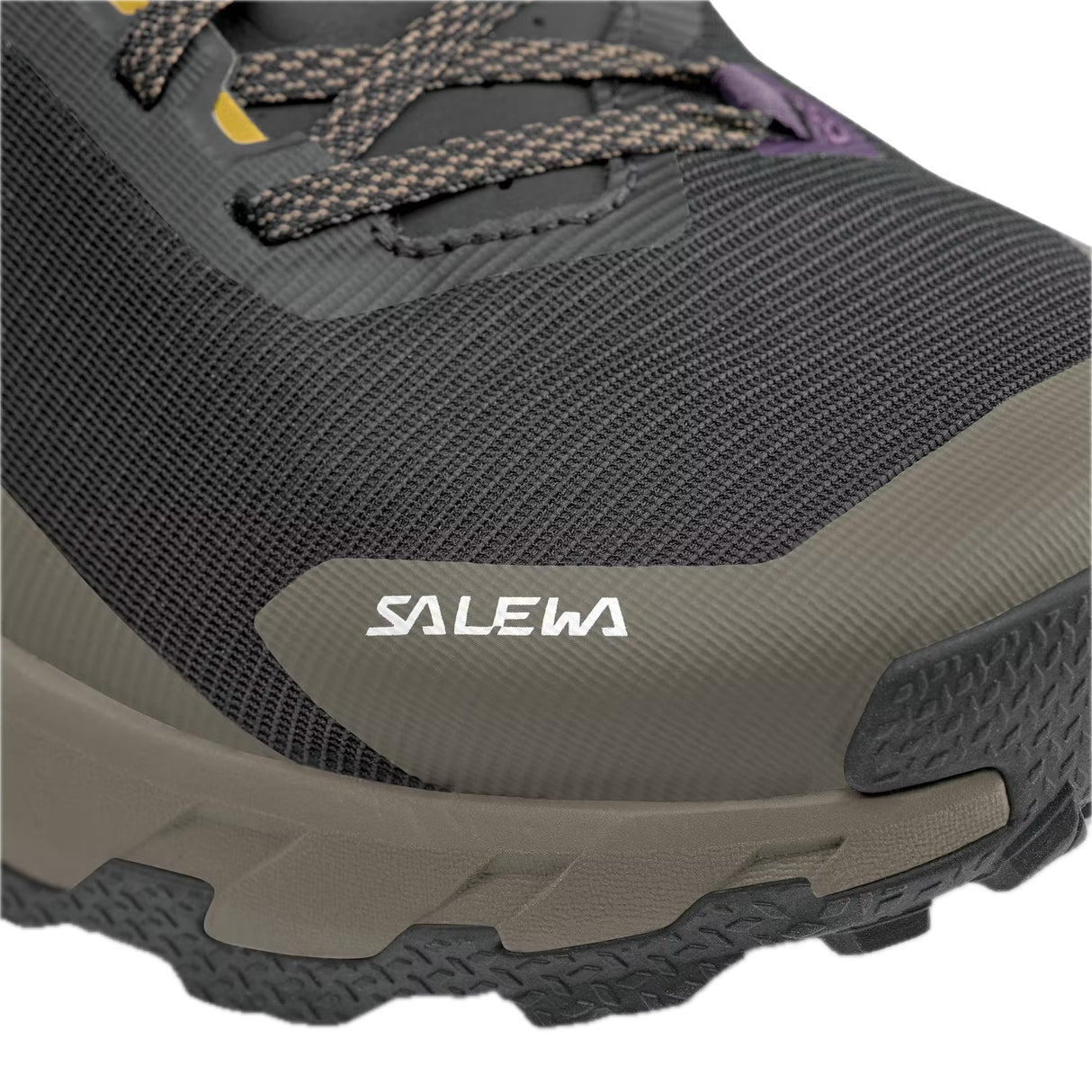 Close-up of a gray hiking shoe with Salewa branding on a white background